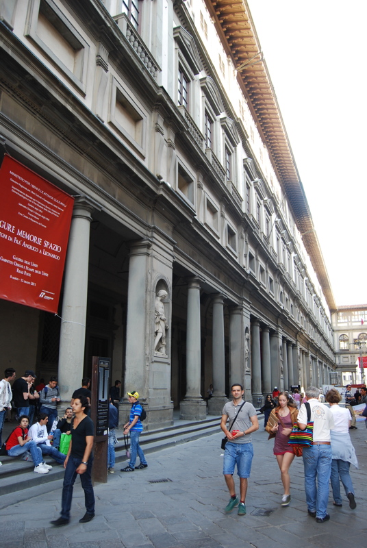 21 - The historic exterior courtyard and facade of the Uffizi Gallery (Galleria degli Uffizi) in Florence, Italy, a world-famous art museum designed by Giorgio Vasari in the 16th century